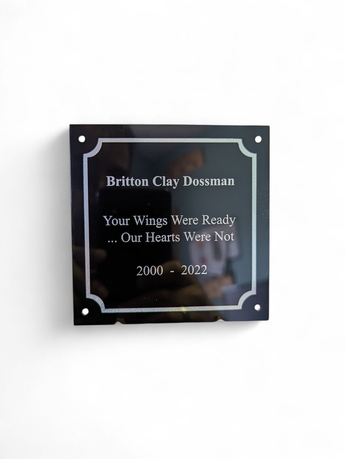 Black Metal Plate With Silver Text Engraving