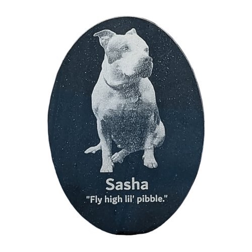 White engraved on black tile for Sasha dog, "Fly high lil' pibble".