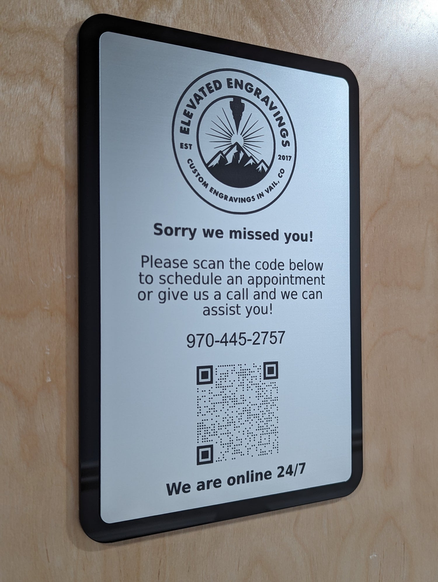 black and metal silver indoor sign for elevated engravings business signage qr.