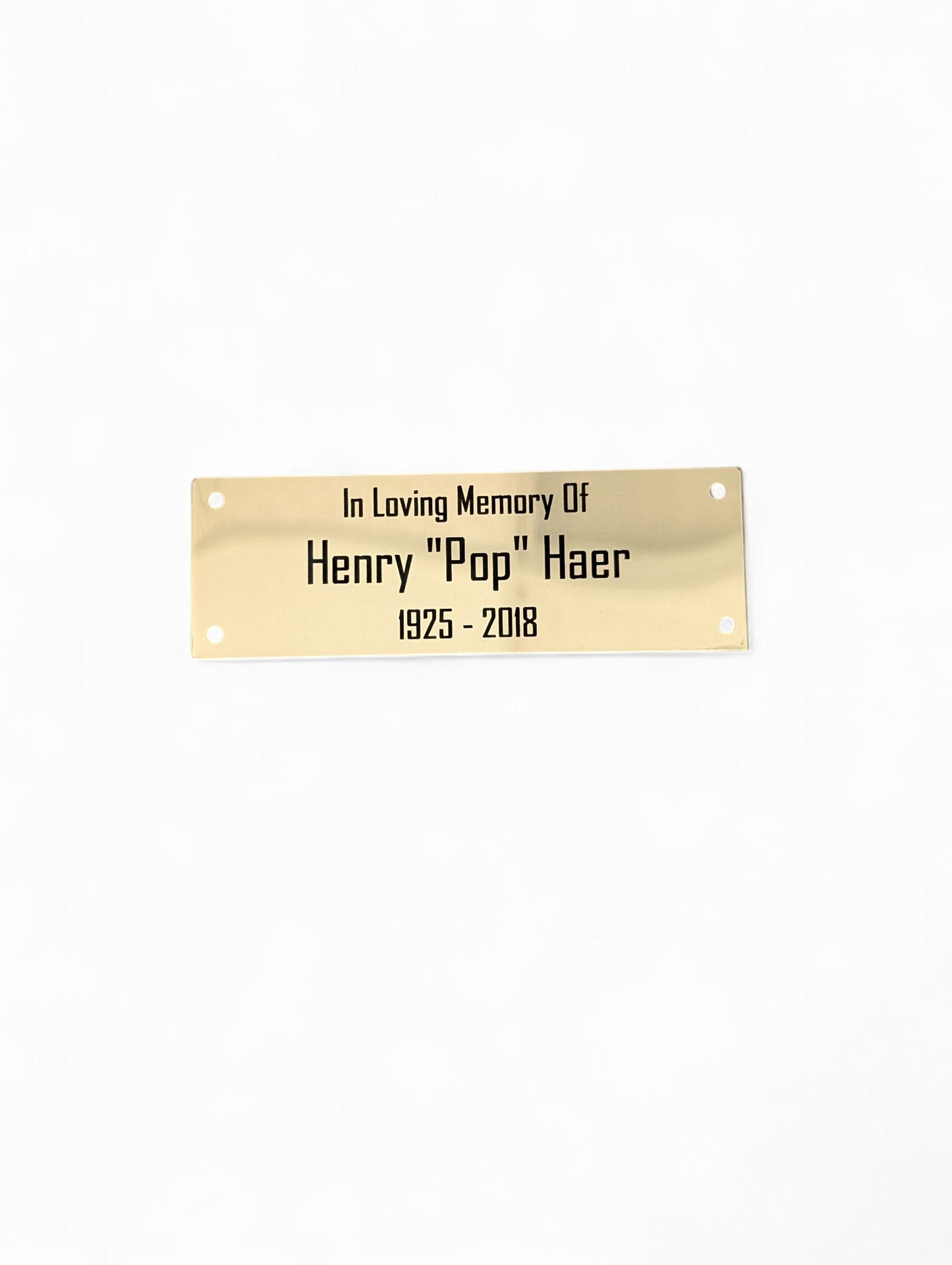 Gold Metal Plate With Black Text Engraving