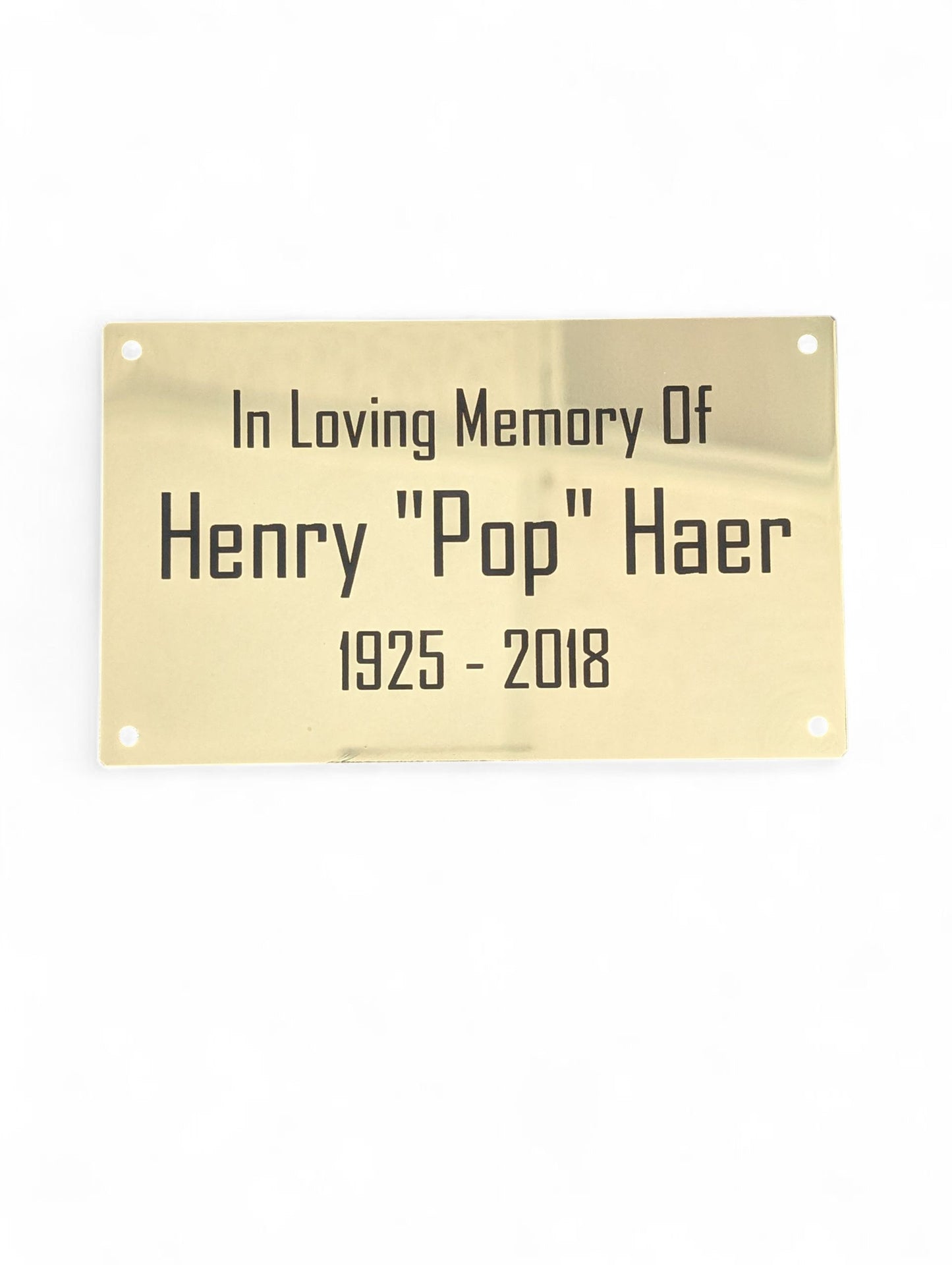 Gold Metal Plate With Black Text Engraving