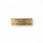 Gold Metal Plate With Black Text Engraving