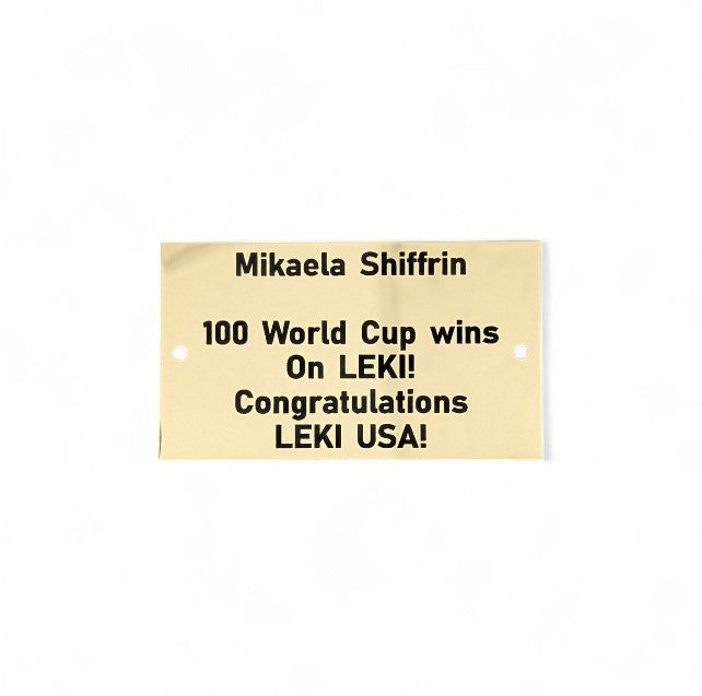 Gold Metal Plate With Black Text Engraving