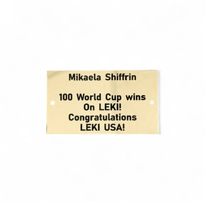 Gold Metal Plate With Black Text Engraving